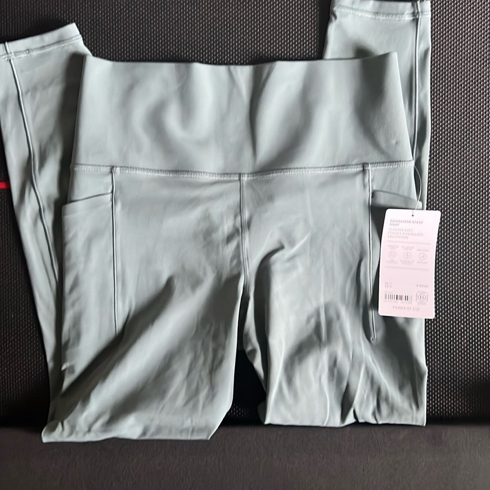Athleta salutation stash tight